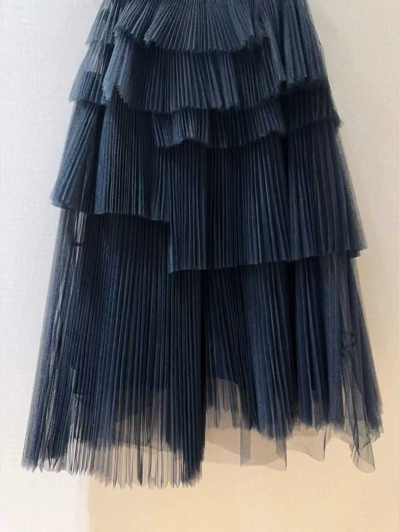 Custom silhouette multi-layered asymmetrical pleated tulle skirt